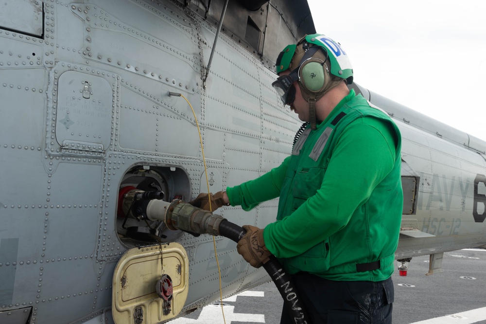 USS Blue Ridge (LCC 19) conducts flight operations in the Coral Sea