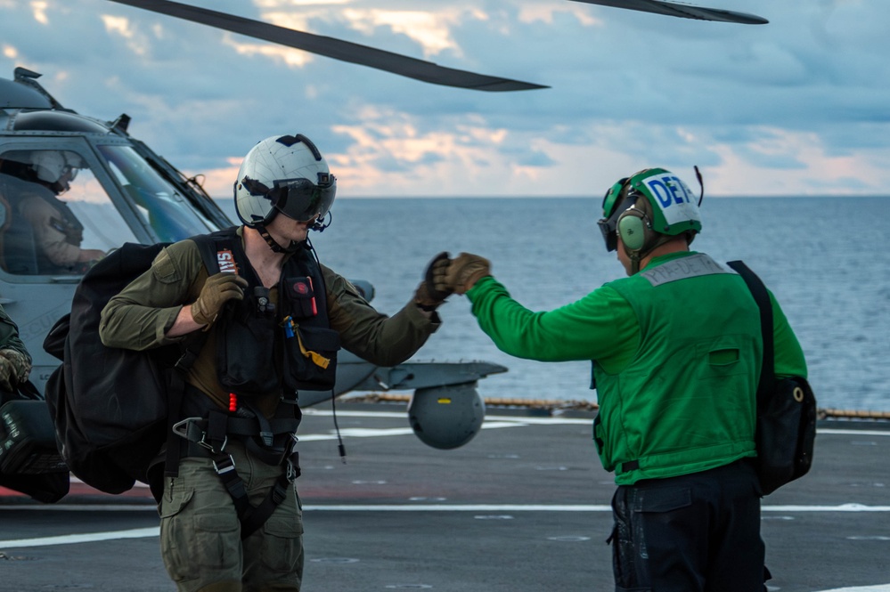 USS Blue Ridge (LCC 19) conducts flight operations in the Coral Sea