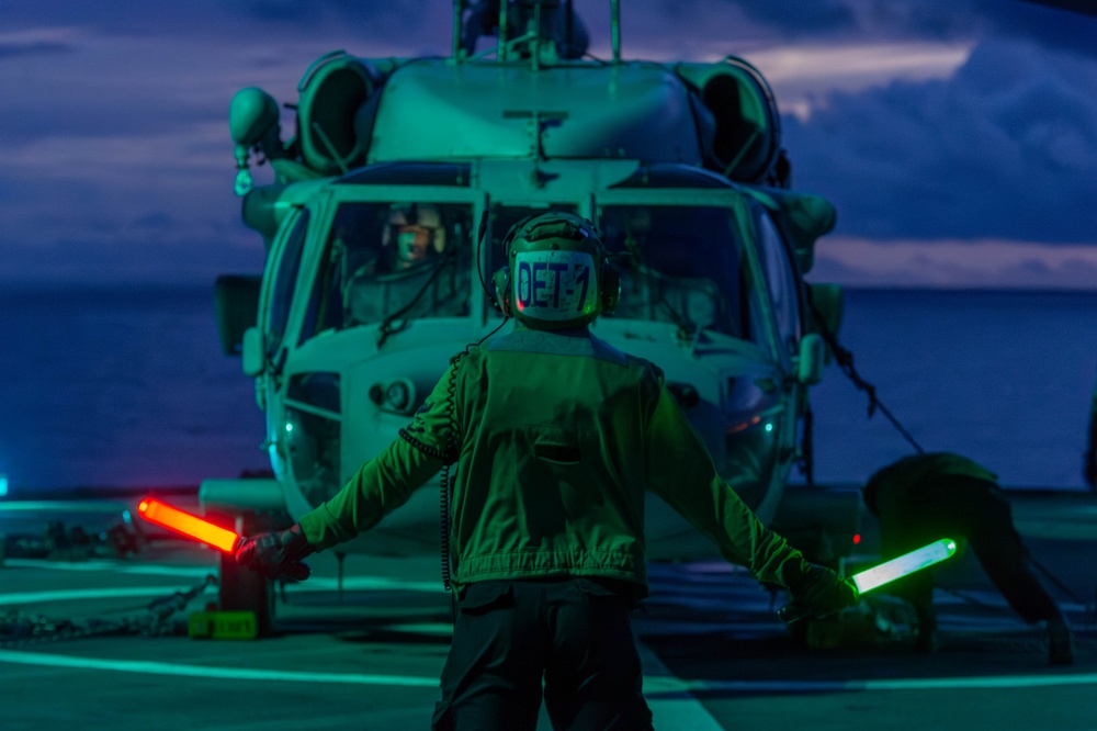 USS Blue Ridge (LCC 19) conducts flight operations in the Coral Sea