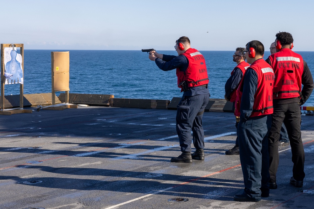 Iwo Jima Sailors Conduct Pistol Qualification