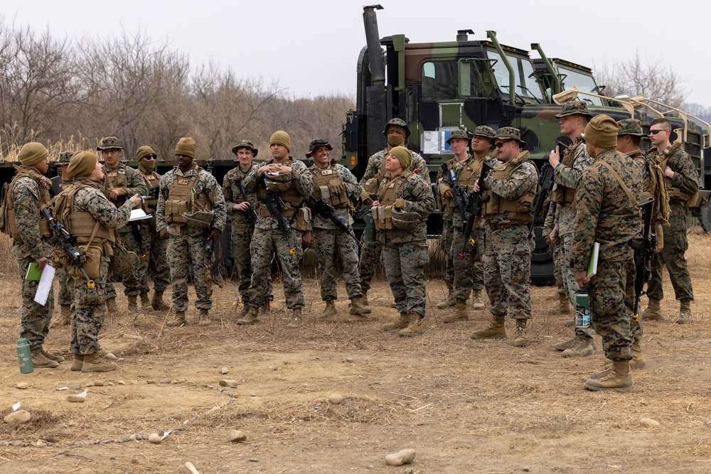 U.S. Marines and Sailors perform convoy operations