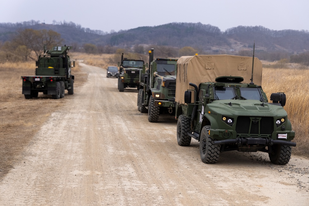 U.S. Marines and Sailors perform convoy operations