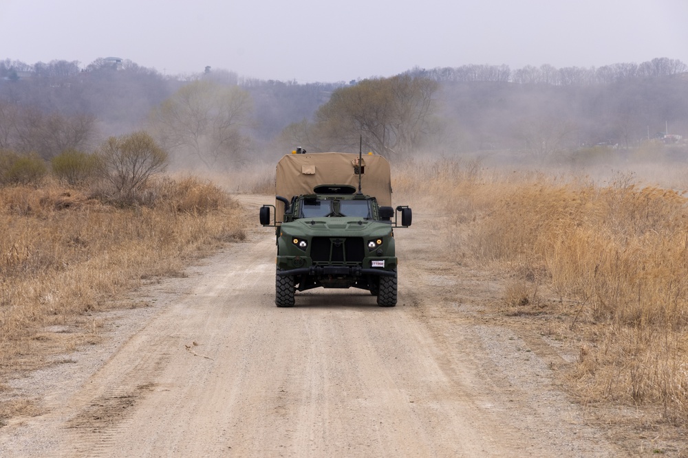 U.S. Marines and Sailors perform convoy operations