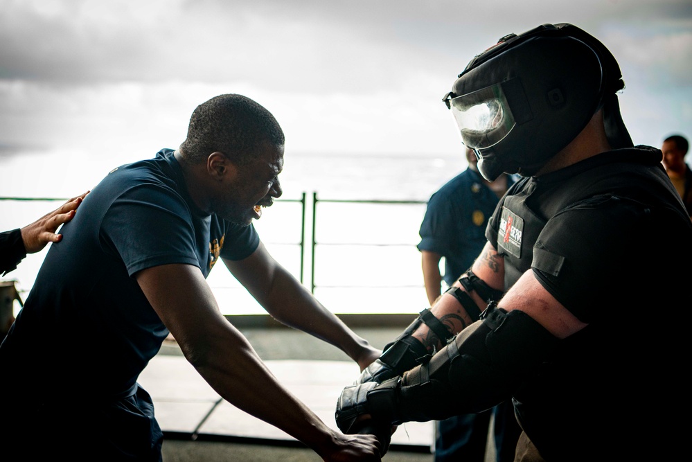 Nimitz Sailors Participate in an OC Spray Course