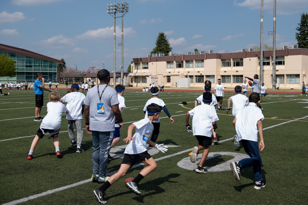 Yokota hosts NFL ProCamp for military kids