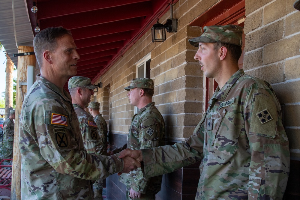 Maj. Gen Scott Naumann meets with service members