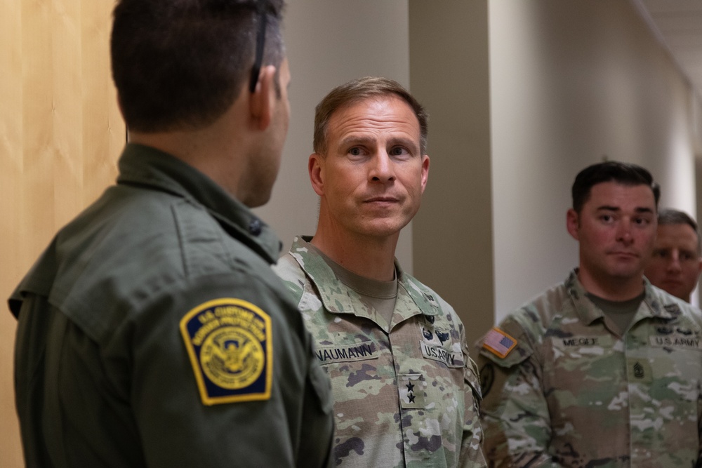 Maj. Gen Scott Naumann greets personnel at southern border