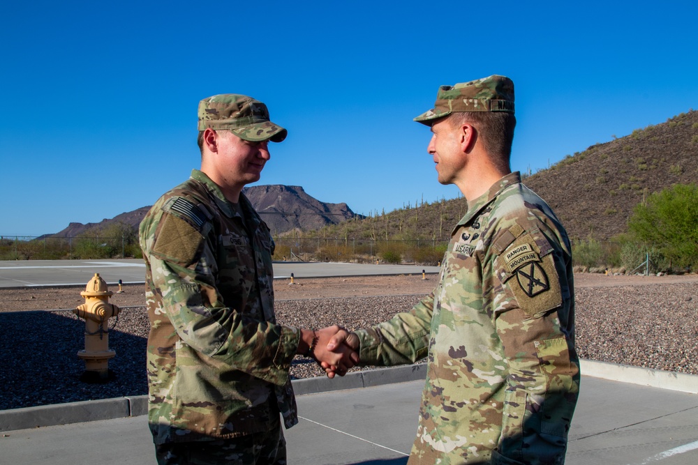 Maj. Gen Scott Naumann greets Soldiers
