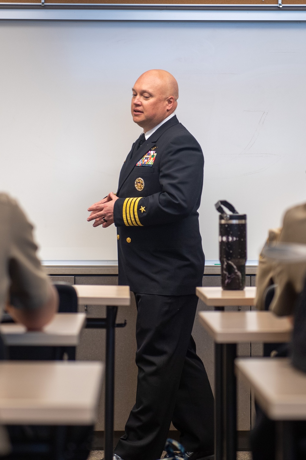 USS Ronald Reagan (CVN 76) commanding officer, Capt. Dale Gregory speaks to students about leadership