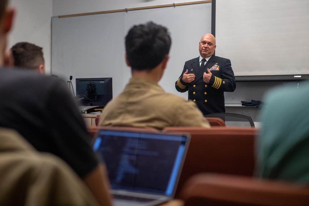 USS Ronald Reagan (CVN 76) commanding officer, Capt. Dale Gregory speaks to students about leadership
