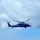 HSC-25 helicopter crew investigates debris west of Guam