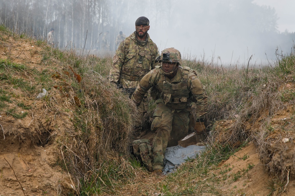 U.S. Army Soldiers Run Bayonet Lanes During British Army Leader Development Programme