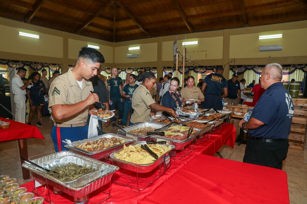 Sailors hold an opening ceremony for Navy Week in Pago Pago, American Samoa
