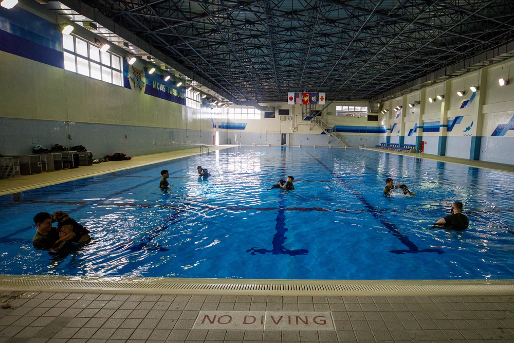 U.S. Marines conduct K9 water aggression and confidence training at MCAS Iwakuni