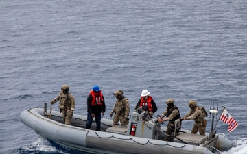 U.S.S. Stockdale conducts small-boat operations with U.S. Coast Guard