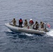 U.S.S. Stockdale conducts small-boat operations with U.S. Coast Guard