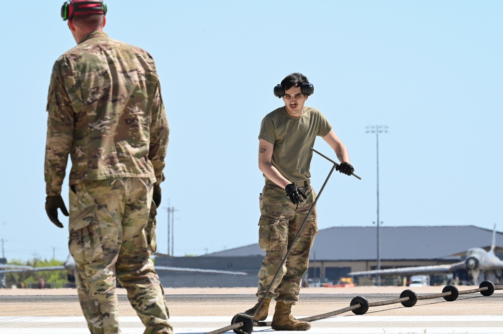7th CES Airmen install Mobile Aircraft Arresting System in preparation for Wings Over West Texas Airshow