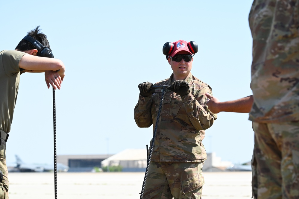 7th CES Airmen install Mobile Aircraft Arresting System in preparation for Wings Over West Texas Airshow