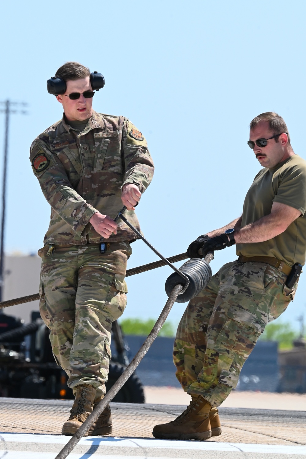 7th CES Airmen install Mobile Aircraft Arresting System in preparation for Wings Over West Texas Airshow