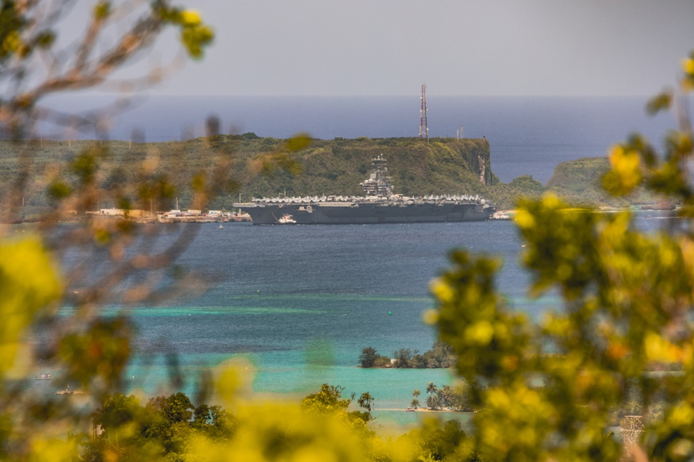 USS Nimitz (CVN 68) pulls into Guam for a port visit