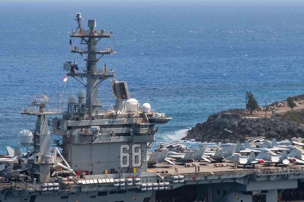 USS Nimitz (CVN 68) pulls into Guam for a port visit