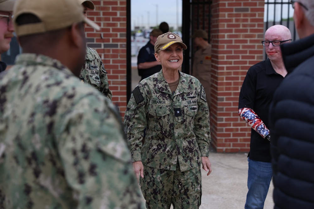 Rear Adm. Treanor and Army Combat Veteran Michael Schlitz visit USS Albany