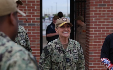 Rear Adm. Treanor and Army Combat Veteran Michael Schlitz visit USS Albany
