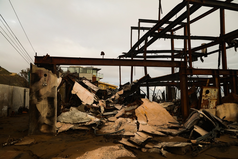 Wildfire damage near a California National Guard Traffic Control Point