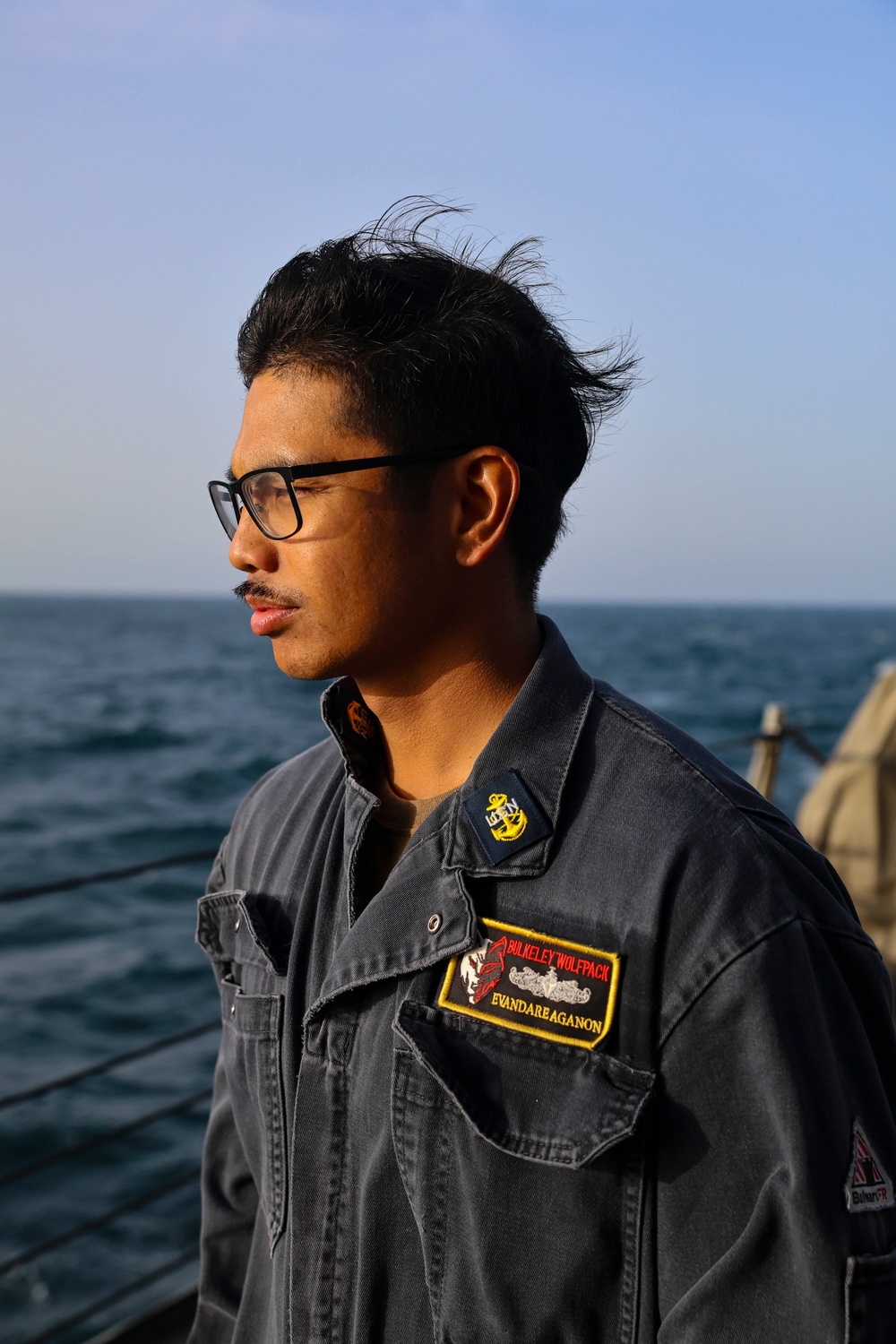 Chief Boatswain’s Mate Evandare Aganon searches the horizon.
