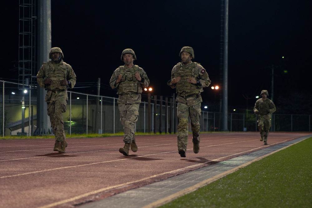 Soldiers Conduct A Physical Assessment To Get Their Expert Field Medical Badge
