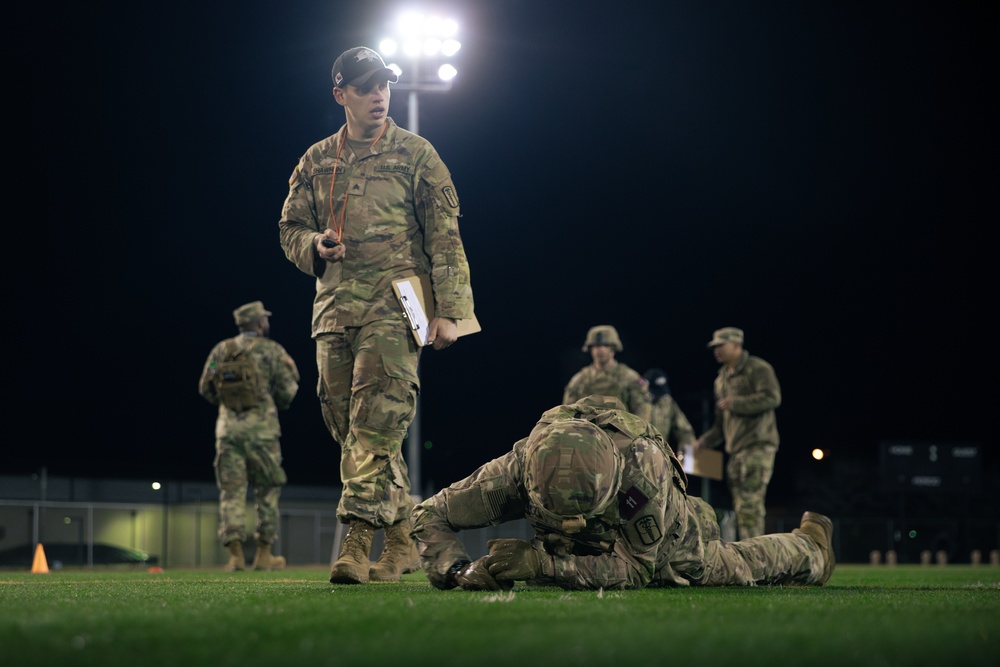Soldiers Conduct A Physical Assessment To Get Their Expert Field Medical Badge