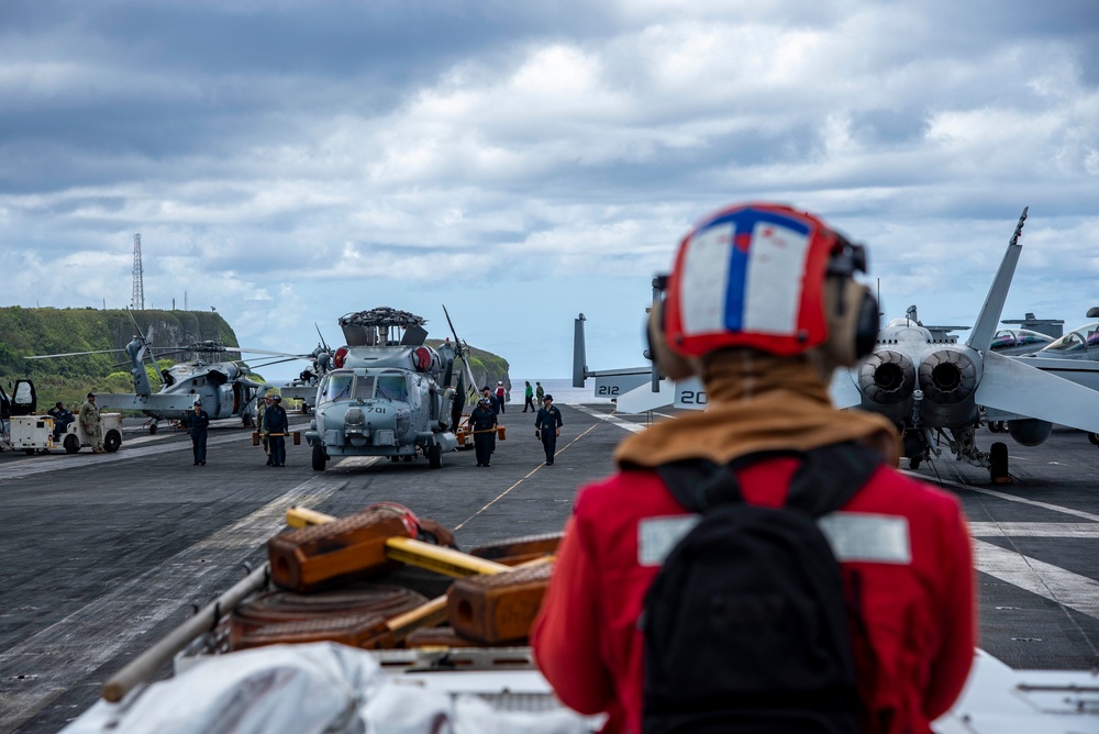 USS Nimitz Departs Naval Base Guam