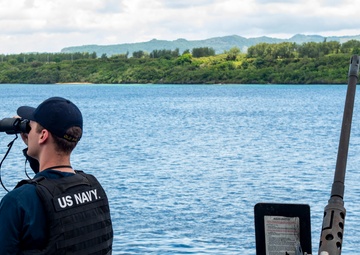 USS Nimitz Departs Naval Base Guam