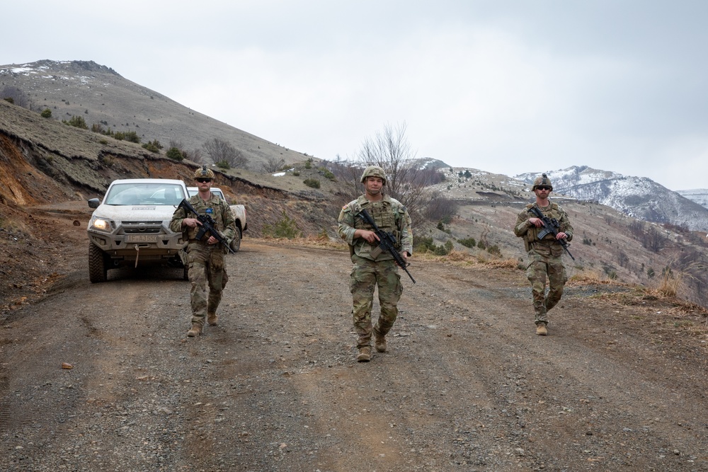 U.S. Soldiers, assigned to KFOR 34, conduct routine security patrol in Kosovo