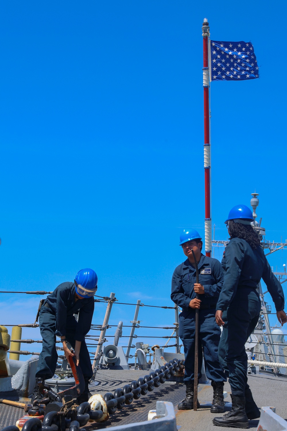U.S. Navy Sailors release the brake on the centerline anchor in preparation to depart Naval Station (NAVSTA) Rota, Spain.