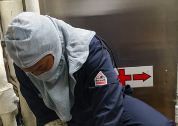 U.S. Navy Sailor sets material condition Zebra during a general quarters training.