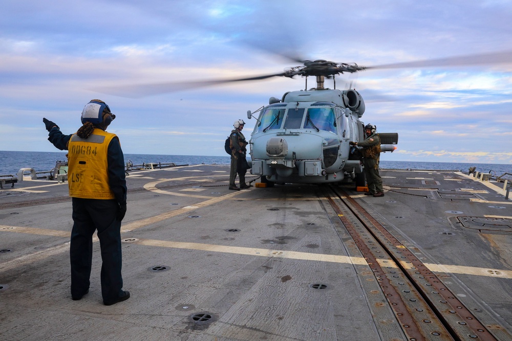 USS Bulkeley deploys a MH-60R Sea Hawk helicopter.