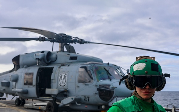 Ground crew completes a preflight check