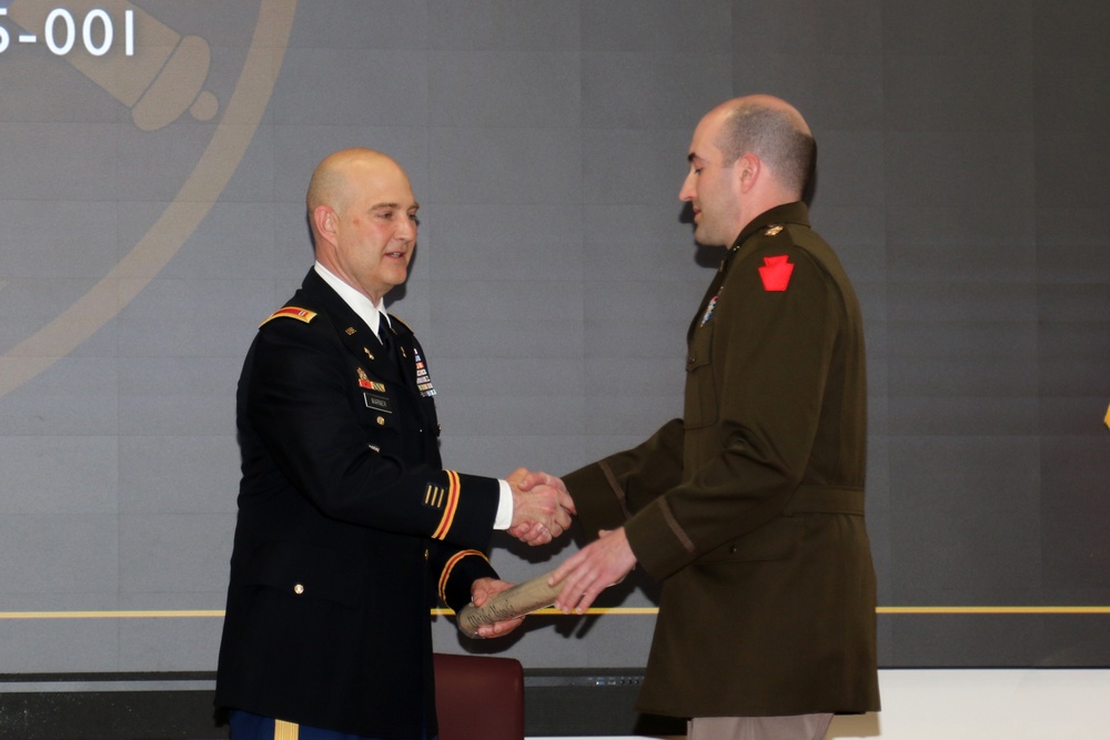 Warrant Officer candidates graduate, receive commission