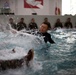 U.S. Marines with MWSS-171 swim in preparation for egress training.