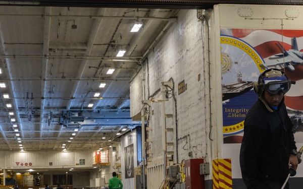 Ford Sailors Clean the Hangar Bay