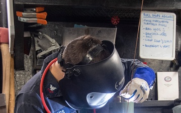 USS Ronald Reagan (CVN 76) Sailors conduct routine operations and ship maintenance