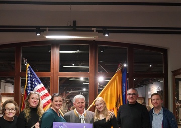 Bavaria public affairs officer receives accolade, honors during retirement event