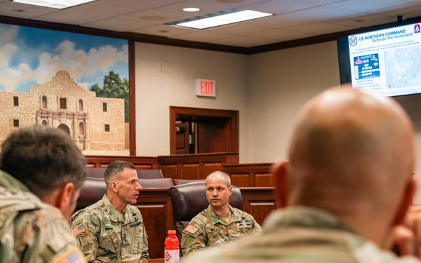 U.S. Army North Commander speaks with the 160th Special Operations Aviation Regiment