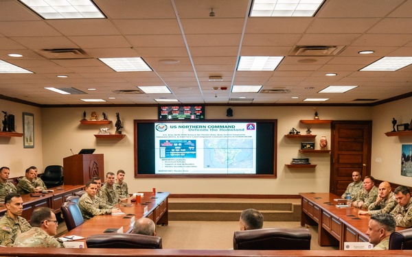 U.S. Army North Commander speaks with the 160th Special Operations Aviation Regiment