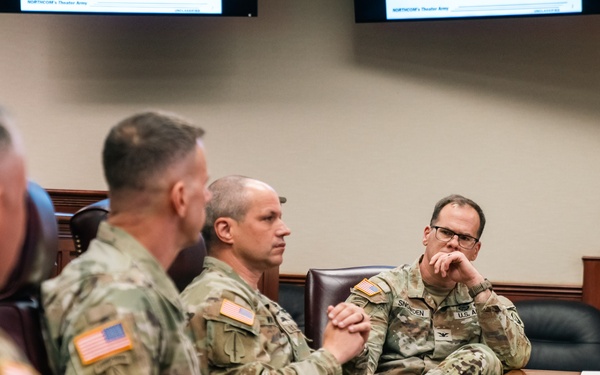 U.S. Army North Commander speaks with the 160th Special Operations Aviation Regiment