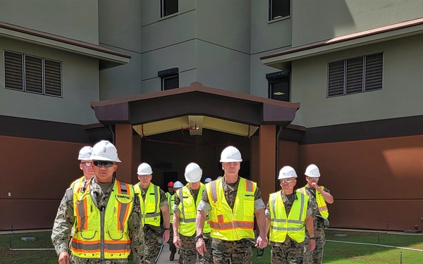 A Civil Engineering Officer Briefs General Mahoney on Construction Progress at Marine Corps Base Camp Blaz