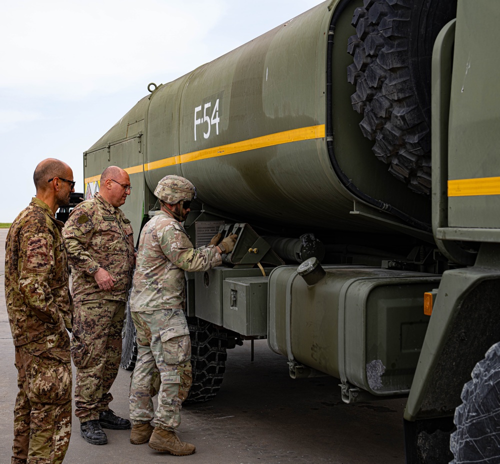 Soldiers from 1AD recover an Italian fuel truck