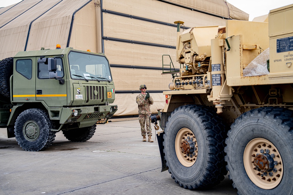 Soldiers from 1AD recover an Italian fuel truck