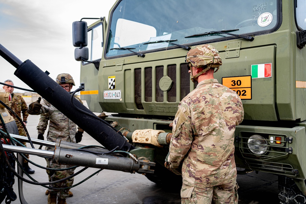 Soldiers from 1AD recover an Italian fuel truck